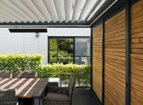 pergola bioclimatique chauffante avec stores